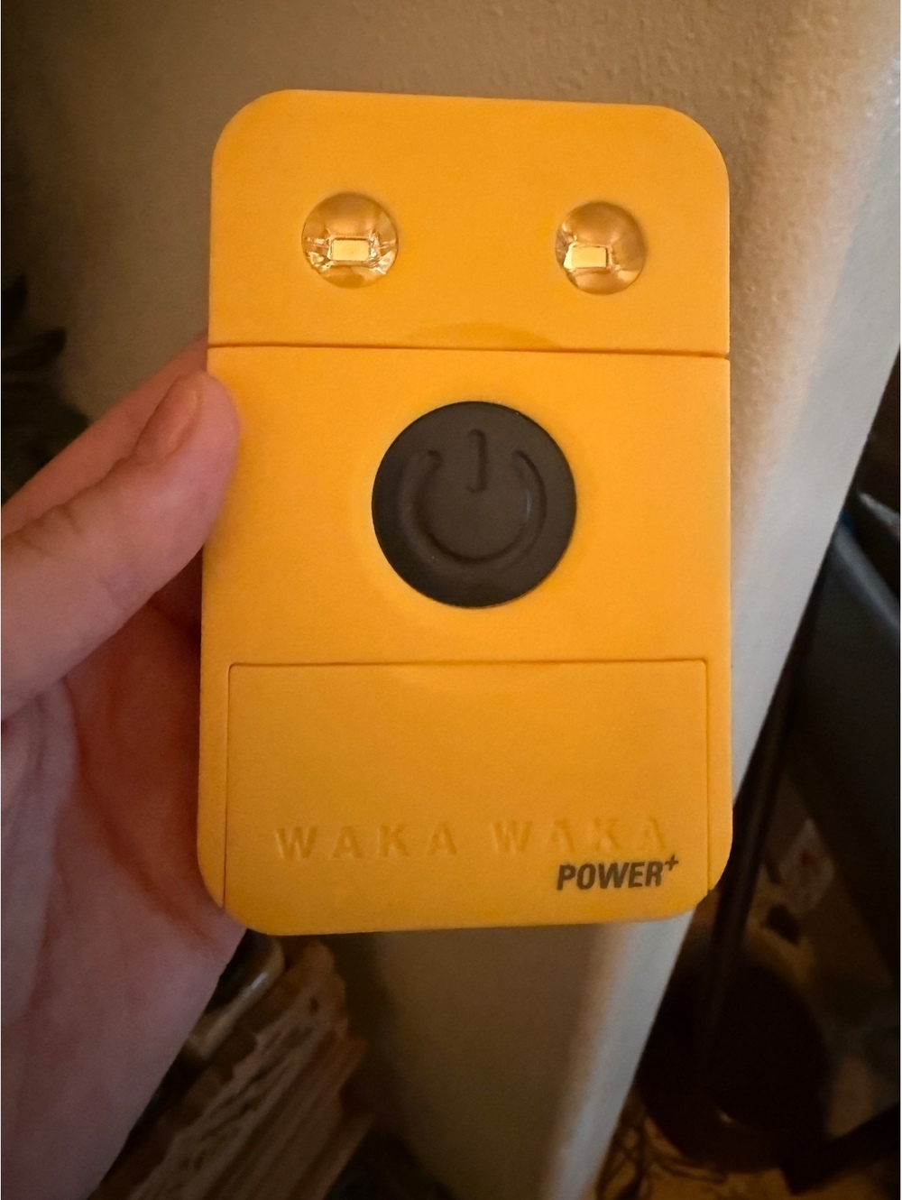 Portable Solar powered charger yellow energy and led light